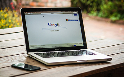 Open laptop showing search engine website highlighting the importance of Toms River SEO services